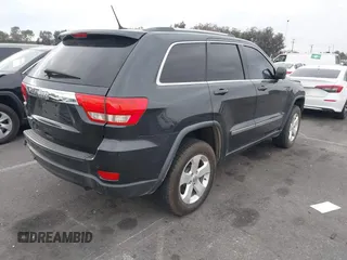 2013 Jeep Grand Cherokee Laredo with VIN 1C4RJEAGXDC620968, listed as a IAAI auction lot 41425270 with 127,739 mi miles. Bid and sale history available at carsss.com. Image 4.
