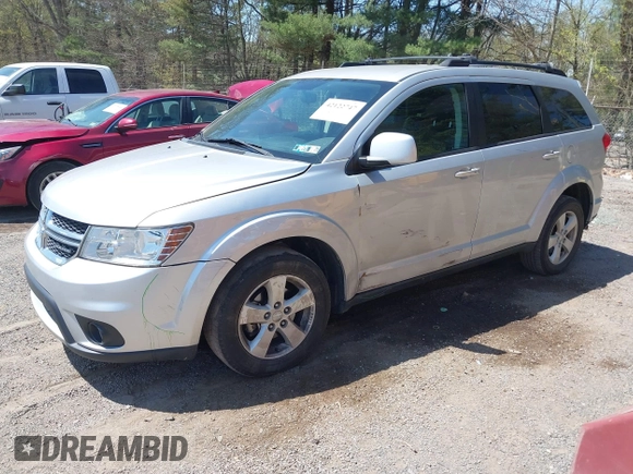 2011 Dodge Journey Mainstreet with VIN 3D4PH1FG4BT562414, listed as a IAAI auction lot 42122747 with 132,488 mi miles and . Bid and sale history available at DreamBid. Image 2.