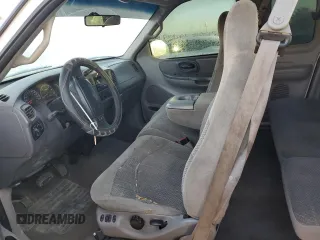 2000 Ford F-150 XL with VIN 1FTRX18L3YKA09007, listed as a Copart auction lot 42828005 with 218,563 mi miles and Salvage Title. Bid and sale history available at carsss.com. Image 7.