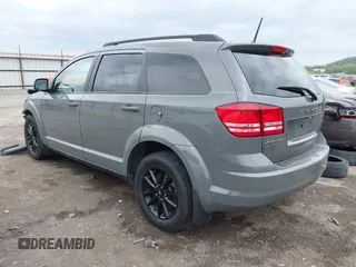 2020 Dodge Journey SE Value with VIN 3C4PDCAB0LT253914, listed as a IAAI auction lot 42064609 with 65,667 mi miles and . Bid and sale history available at carsss.com. Image 3.