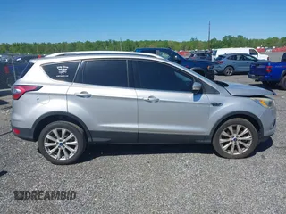 2018 Ford Escape Titanium with VIN 1FMCU9J96JUA33500, listed as a IAAI auction lot 42121736 with 105,430 mi miles and . Bid and sale history available at DreamBid. Image 13.