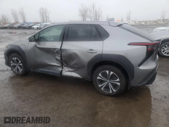 2023 Toyota bZ4X XLE with VIN JTMABACA8PA040484, listed as a Copart auction lot 51410705 with 9,807 mi miles and Salvage Title. Bid and sale history available at DreamBid. Image 2.