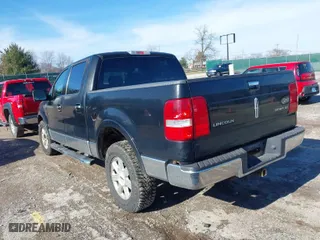 2006 Lincoln Mark LT with VIN 5LTPW18586FJ11319, listed as a IAAI auction lot 41465999 with 330,580 mi miles. Bid and sale history available at carsss.com. Image 3.