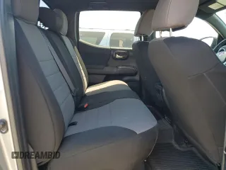 2018 Toyota Tacoma SR with VIN 3TMCZ5AN6JM129370, listed as a Copart auction lot 63042425 with 65,189 mi miles and Salvage title. Bid and sale history available at DreamBid. Image 10.