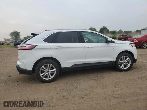2020 Ford Edge SEL z VIN 2FMPK4J95LBB21392, wystawiony jako Copart lot #60912275 z przebiegiem 82 527 mil mil oraz Szkoda całkowita • Salvage title. Historia ofert i sprzedaży dostępna na DreamBid. Obrazek 3.