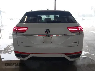 2021 Volkswagen Atlas SE z VIN 1V2NE2CA4MC201281, wystawiony jako IAAI lot #41242760 z przebiegiem 95 209 mil mil oraz . Historia ofert i sprzedaży dostępna na DreamBid. Obrazek 17.