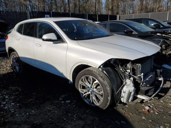 2018 BMW X2 sDrive28i with VIN WBXYJ3C37JEP76866, listed as a Copart auction lot 82595244 with 67,817 mi miles and Salvage Title. Bid and sale history available at carsss.com. Image 4.