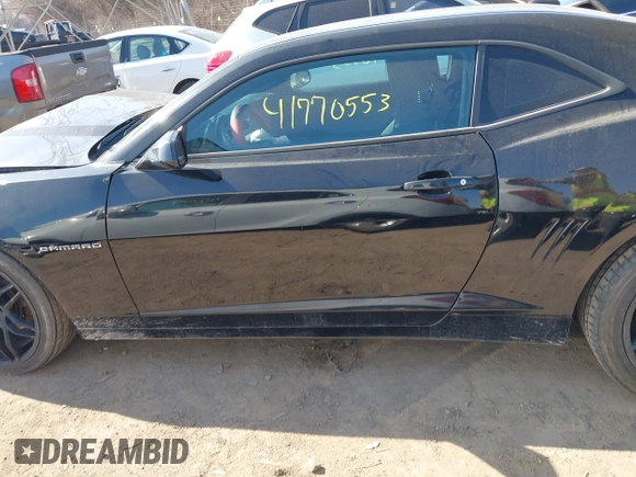 2014 Chevrolet Camaro LS z VIN 2G1FA1E36E9246671, wystawiony jako IAAI lot #41770553 z przebiegiem 170 121 mil mil oraz . Historia ofert i sprzedaży dostępna na DreamBid. Obrazek 15.