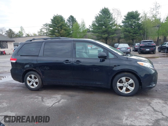 2014 Toyota Sienna LE AAS with VIN 5TDKK3DC0ES487830, listed as a IAAI auction lot 42216342 with 155,973 mi miles and . Bid and sale history available at carsss.com. Image 13.