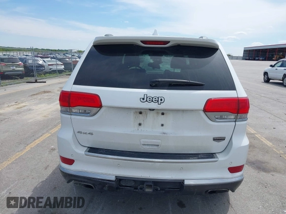 2014 Jeep Grand Cherokee Summit with VIN 1C4RJFJG0EC174871, listed as a IAAI auction lot 42341312 with 170,743 mi miles and . Bid and sale history available at DreamBid. Image 19.
