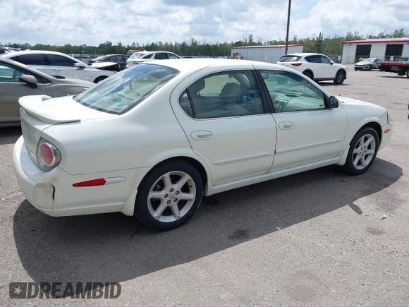 2003 Nissan Maxima SE z VIN JN1DA31DX3T501453, wystawiony jako IAAI lot #42116346 z przebiegiem 127 364 mil mil oraz . Historia ofert i sprzedaży dostępna na DreamBid. Obrazek 4.