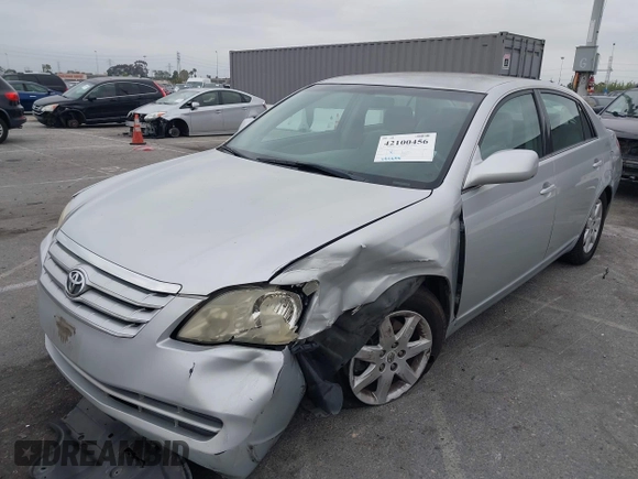 2005 Toyota Avalon XL with VIN 4T1BK36B25U036071, listed as a IAAI auction lot 42100456 with 185,898 mi miles and . Bid and sale history available at carsss.com. Image 2.