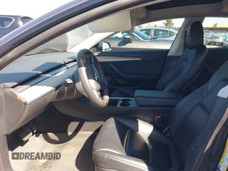 2021 Tesla Model 3 Long Range with VIN 5YJ3E1EB9MF997442, listed as a IAAI auction lot 41759875 with 87,059 mi miles. Bid and sale history available at carsss.com. Image 5.