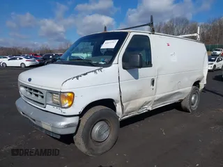 2001 Ford Econoline Cargo with VIN 1FTNE24221HB32842, listed as a IAAI auction lot 41677717 with 221,642 mi miles. Bid and sale history available at carsss.com. Image 2.