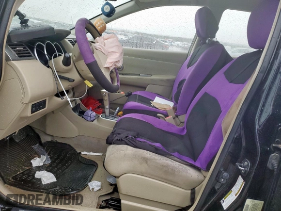 2009 Nissan Versa S with VIN 3N1BC13E99L484430, listed as a Copart auction lot 54484725 with 86,619 mi miles and Salvage Title. Bid and sale history available at DreamBid. Image 7.
