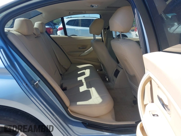 2014 BMW 3 Series 320i xDrive with VIN WBA3C3C59EF986353, listed as a IAAI auction lot 42383107 with 142,836 mi miles and . Bid and sale history available at DreamBid. Image 8.
