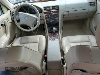 2000 Mercedes-Benz C 230 Kompressor with VIN WDBHA24GXYA855697, listed as a Copart auction lot 52633465 with 191,235 mi miles and Salvage Title. Bid and sale history available at carsss.com. Image 8.