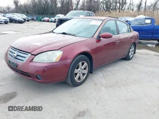 2002 Nissan Altima S with VIN 1N4AL11DX2C216559, listed as a IAAI auction lot 41540001 with 112,084 mi miles. Bid and sale history available at carsss.com. Image 2.