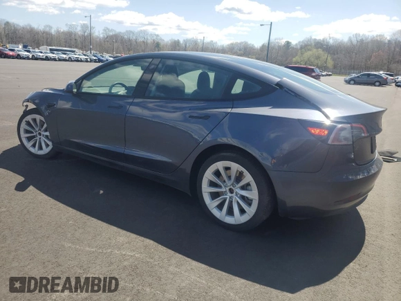 2022 Tesla Model 3 Long Range with VIN 5YJ3E1EBXNF188596, listed as a Copart auction lot 51846915 with 49,271 mi miles and Non Repairable. Bid and sale history available at carsss.com. Image 2.