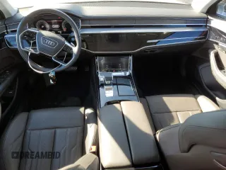 2023 Audi A8 with VIN WAULDAF83PN011055, listed as a Copart auction lot 80932444 with 9,734 mi miles and Salvage Title. Bid and sale history available at carsss.com. Image 8.