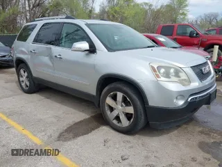 2011 GMC Acadia SLT1 with VIN 1GKKVRED0BJ384549, listed as a IAAI auction lot 41948550 with 219,341 mi miles. Bid and sale history available at carsss.com. Image 1.