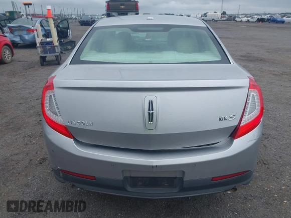2013 Lincoln MKS с VIN 1LNHL9DK3DG604712, выставлен на аукционе IAAI как лот 42351237 с пробегом 144 927 миль миль и . История ставок и продаж доступна на DreamBid. Изображение 14.