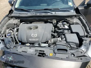 2014 Mazda 3 i Touring z VIN 3MZBM1V7XEM100522, wystawiony jako Copart lot #58314585 z przebiegiem 78 548 mil mil oraz Szkoda całkowita • Salvage title. Historia ofert i sprzedaży dostępna na DreamBid. Obrazek 11.