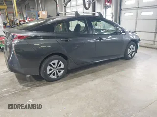 2017 Toyota Prius Two with VIN JTDKBRFU9H3577850, listed as a IAAI auction lot 40937287 with 130,856 mi miles. Bid and sale history available at carsss.com. Image 4.