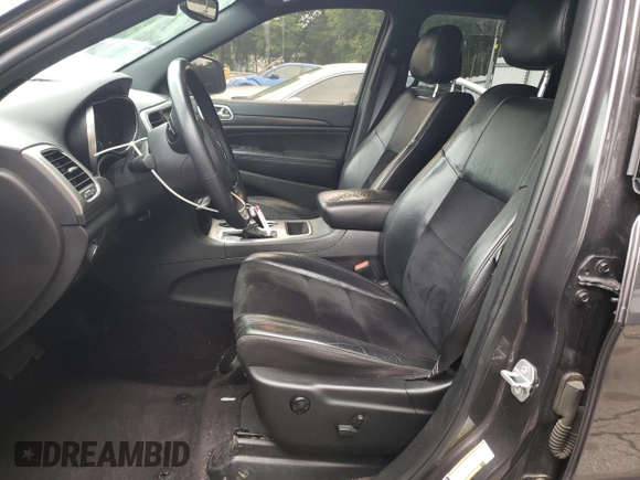 2018 Jeep Grand Cherokee Altitude with VIN 1C4RJEAG0JC208506, listed as a Copart auction lot 52669915 with 159,299 mi miles and Salvage title. Bid and sale history available at DreamBid. Image 7.