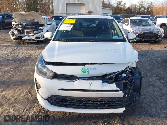 2022 Kia Rio S with VIN 3KPA25AD5NE443465, listed as a IAAI auction lot 41230852 with 20,460 mi miles and . Bid and sale history available at DreamBid. Image 12.