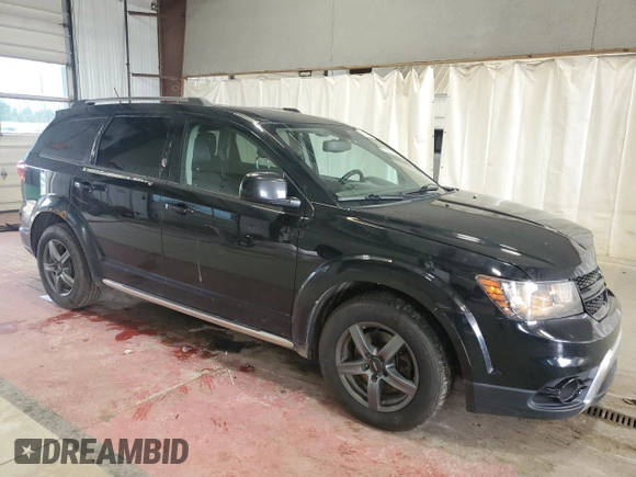 2015 Dodge Journey Crossroad with VIN 3C4PDDGGXFT725744, listed as a Copart auction lot 60808455 with 210,141 mi miles and Salvage title. Bid and sale history available at DreamBid. Image 4.
