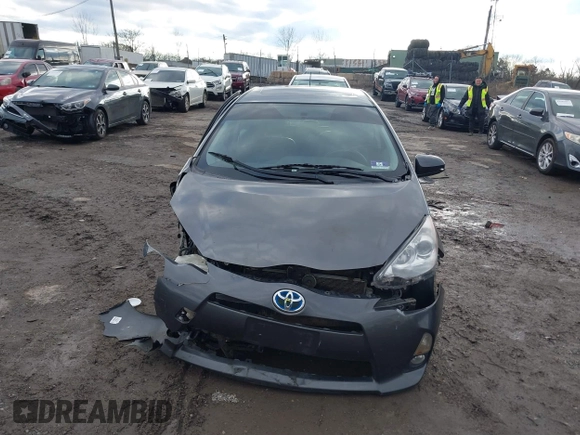 2012 Toyota Prius c One with VIN JTDKDTB31C1029950, listed as a IAAI auction lot 41223112 with 117,660 mi miles. Bid and sale history available at carsss.com. Image 13.