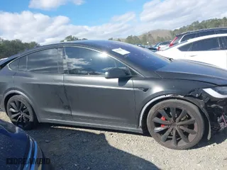 2017 Tesla Model X P100D with VIN 5YJXCDE40HF050418, listed as a IAAI auction lot 41810053 with 93,559 mi miles. Bid and sale history available at carsss.com. Image 13.