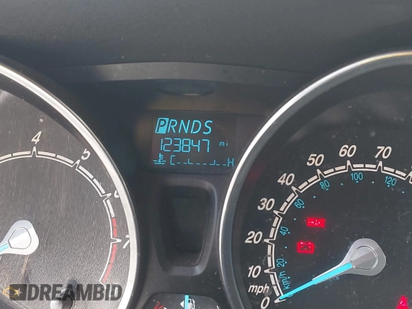 2016 Ford Fiesta SE with VIN 3FADP4BJ4GM106538, listed as a IAAI auction lot 41871345 with 123,847 mi miles. Bid and sale history available at carsss.com. Image 7.