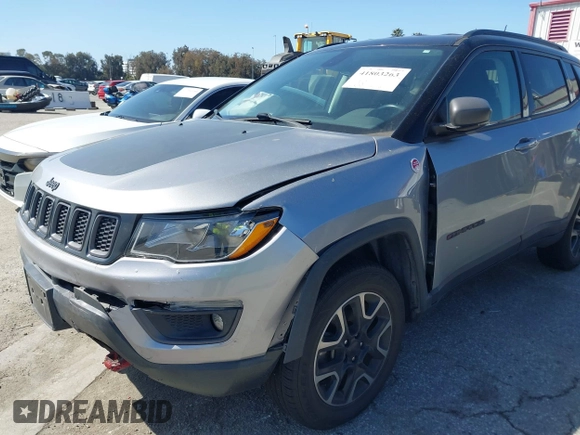 2019 Jeep Compass Trailhawk with VIN 3C4NJDDBXKT627350, listed as a IAAI auction lot 41803263 with 63,768 mi miles and . Bid and sale history available at DreamBid. Image 6.