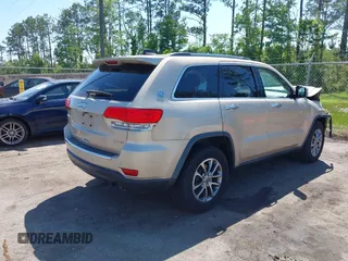 2014 Jeep Grand Cherokee Limited with VIN 1C4RJEBG4EC528934, listed as a IAAI auction lot 42033511 with 63,601 mi miles and . Bid and sale history available at DreamBid. Image 4.