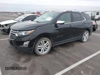 2021 Chevrolet Equinox Premier z VIN 2GNAXXEV4M6118442, wystawiony jako IAAI lot #41392148 z przebiegiem 92 170 mil mil oraz . Historia ofert i sprzedaży dostępna na DreamBid. Obrazek 2.