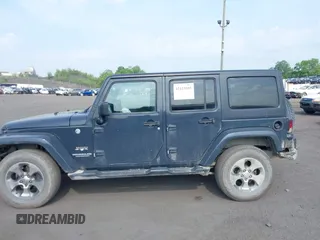 2017 Jeep Wrangler Unlimited Sahara with VIN 1C4BJWEG4HL518945, listed as a IAAI auction lot 42423505 with 155,828 mi miles and . Bid and sale history available at DreamBid. Image 14.