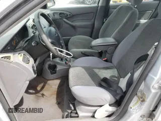 2004 Ford Focus SE with VIN 1FAFP34344W113759, listed as a Copart auction lot 51386335 with 148,267 mi miles and Salvage title. Bid and sale history available at DreamBid. Image 7.