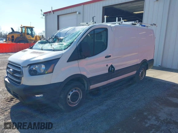 2020 Ford Transit Cargo with VIN 1FTBR1Y8XLKA84383, listed as a IAAI auction lot 41519121 with 61,410 mi miles and . Bid and sale history available at DreamBid. Image 17.