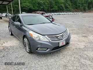 2012 Hyundai Azera z VIN KMHFH4JG2CA170845, wystawiony jako Copart lot #54875955 z przebiegiem 98 047 mil mil oraz Szkoda całkowita • Salvage title. Historia ofert i sprzedaży dostępna na DreamBid. Obrazek 13.