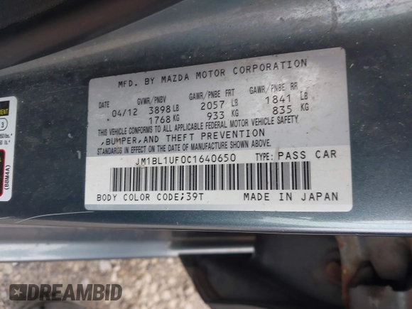 2012 Mazda Mazda3 i Sport with VIN JM1BL1UF0C1640650, listed as a IAAI auction lot 42019342 with 144,611 mi miles. Bid and sale history available at carsss.com. Image 9.