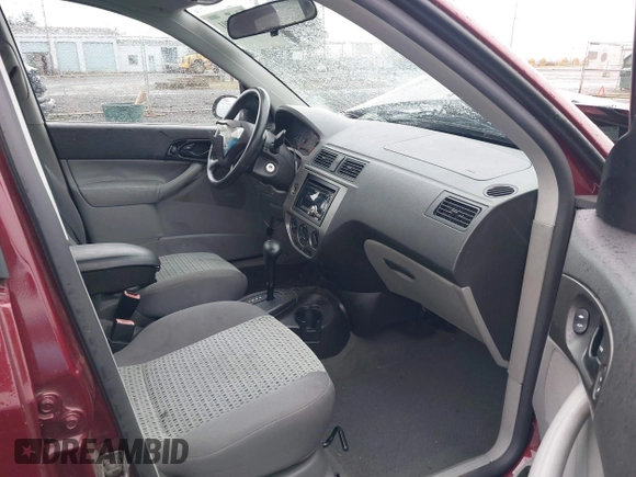2007 Ford Focus S with VIN 1FAHP34N57W187755, listed as a IAAI auction lot 41839701 with Not Provided miles and . Bid and sale history available at carsss.com. Image 5.