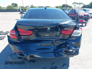 2018 BMW 7 Series 750i with VIN WBA7F0C54JGM22900, listed as a IAAI auction lot 41673673 with 66,264 mi miles. Bid and sale history available at carsss.com. Image 6.