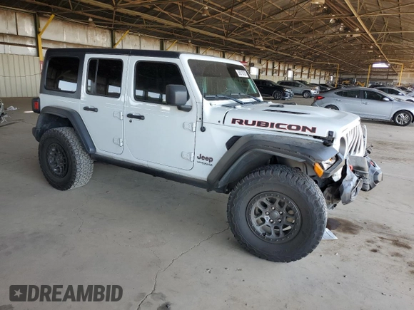 2021 Jeep Wrangler Unlimited Rubicon z VIN 1C4JJXFG5MW767036, wystawiony jako Copart lot #56918355 z przebiegiem 52 994 mil mil oraz Szkoda całkowita • Salvage title. Historia ofert i sprzedaży dostępna na DreamBid. Obrazek 4.