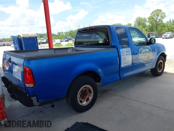 1999 Ford F-150 XL with VIN 1FTRX17L9XNB83680, listed as a IAAI auction lot 42636807 with Not provided miles and . Bid and sale history available at DreamBid. Image 4.