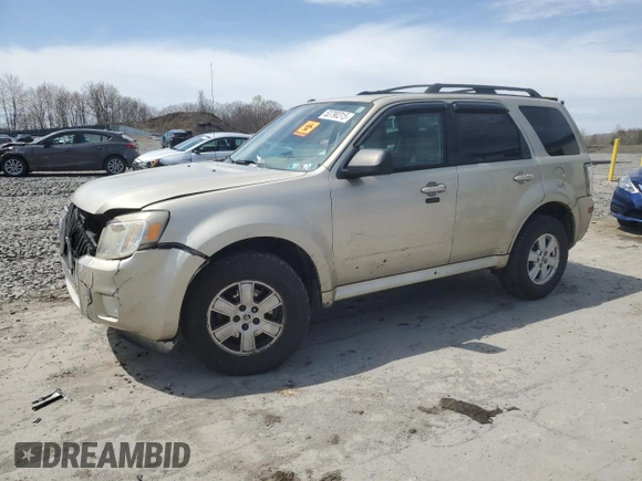 2010 Mercury Mariner z VIN 4M2CN9BG0AKJ17705, wystawiony jako Copart lot #53790315 z przebiegiem 154 832 mil mil oraz Szkody całkowita. Historia ofert i sprzedaży dostępna na DreamBid. Obrazek 1.