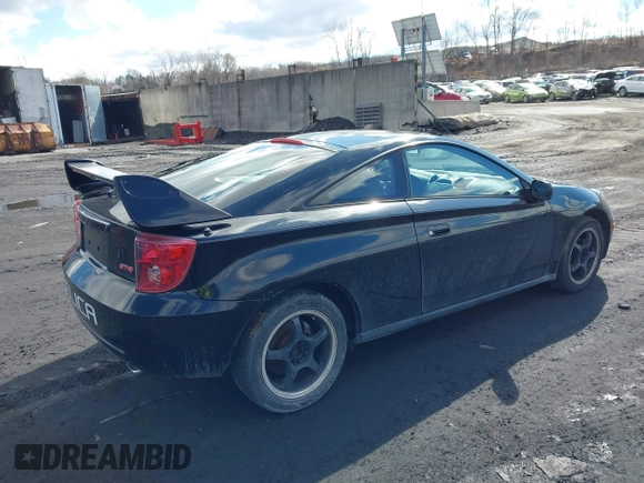 2004 Toyota Celica GTS with VIN JTDDY38T740071423, listed as a IAAI auction lot 41686801 with 146,228 mi miles. Bid and sale history available at carsss.com. Image 4.