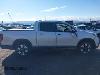 2020 Honda Ridgeline RTL with VIN 5FPYK3F50LB028430, listed as a IAAI auction lot 42033090 with Not provided miles and . Bid and sale history available at DreamBid. Image 13.