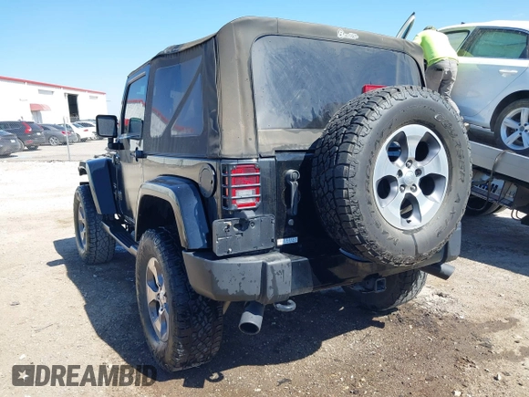 2016 Jeep Wrangler Sahara with VIN 1C4AJWBG0GL174481, listed as a IAAI auction lot 41868149 with 59,300 mi miles and . Bid and sale history available at DreamBid. Image 3.
